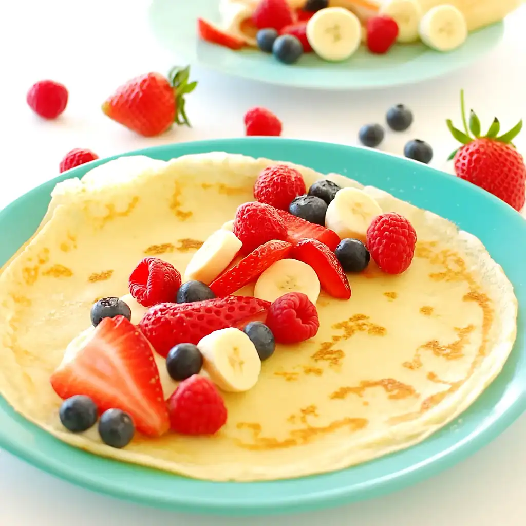 Crêpes met vers fruit en stroop